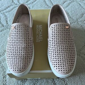 Michael Kors Olivia slip on sneakers.